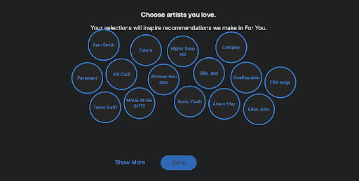 A screenshot of Apple Music’s interactive onboarding screen where users select their favorite artists to tailor their music recommendations