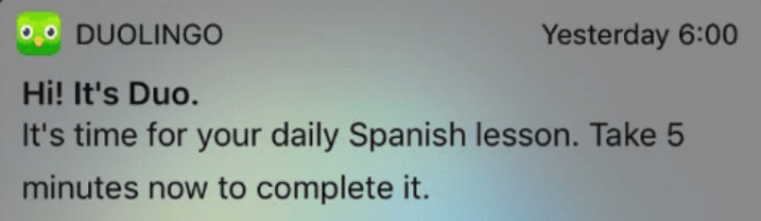 A Duolingo push notification reminding users to complete their daily Spanish lesson.