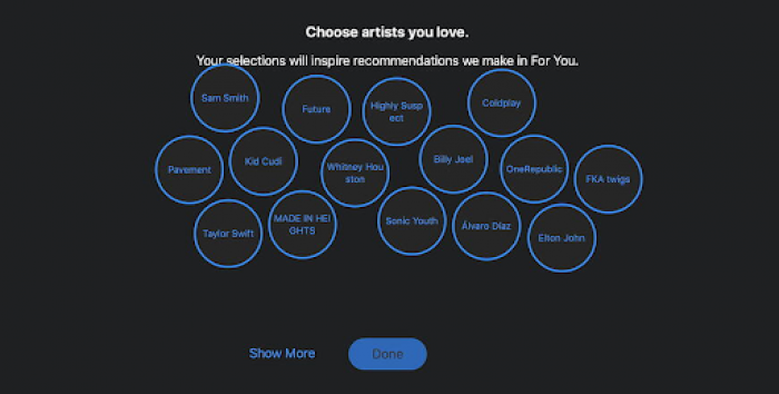 A screenshot of Apple Music’s interactive onboarding screen where users select their favorite artists to tailor their music recommendations