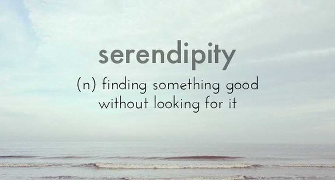A beach scene overlaid with the text 'serendipity (n) finding something good without looking for it'.