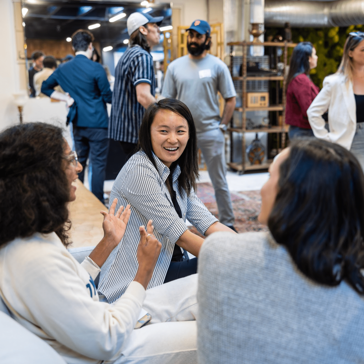 Attendees in conversation at a Chameleon networking event in San Francisco.