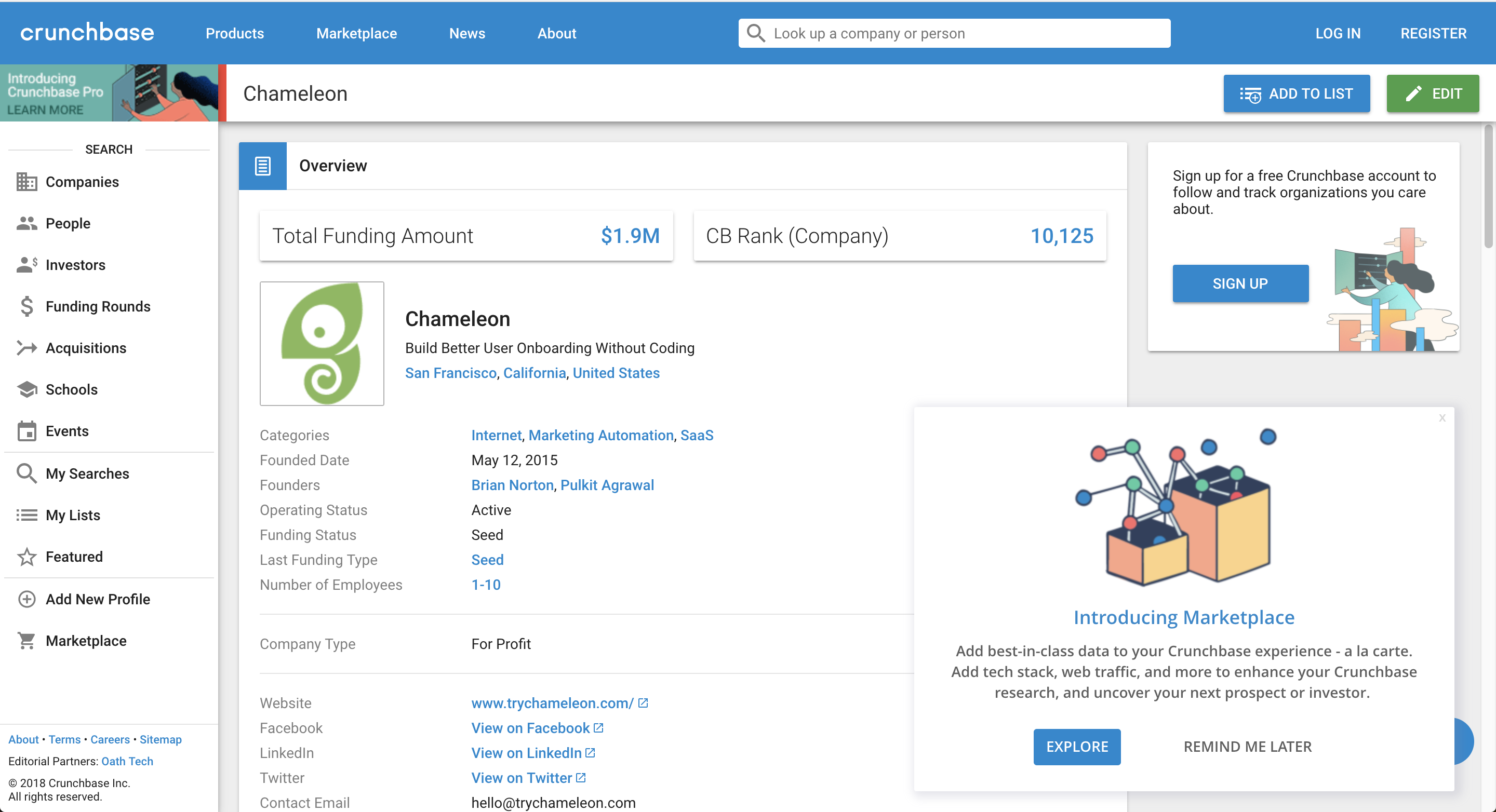 A floating Crunchbase feature announcement popup in the lower-right corner of a company profile page, with an illustration and explore or dismiss options.