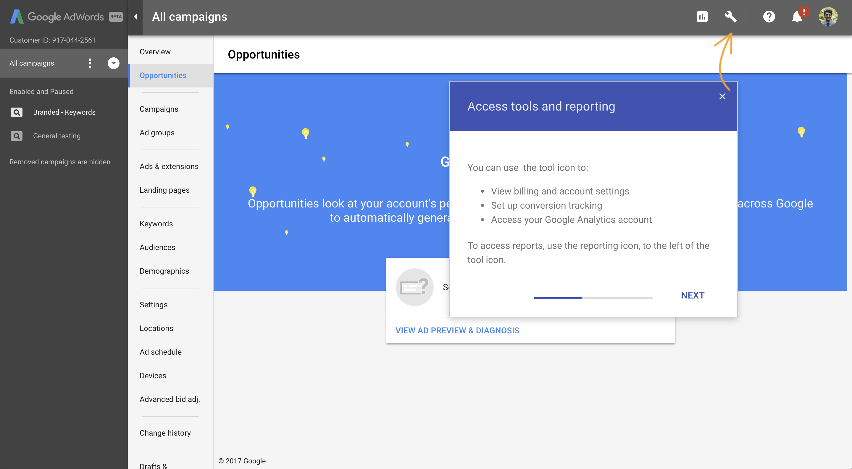 A step in a Google AdWords onboarding tour introducing tools and reporting navigation.