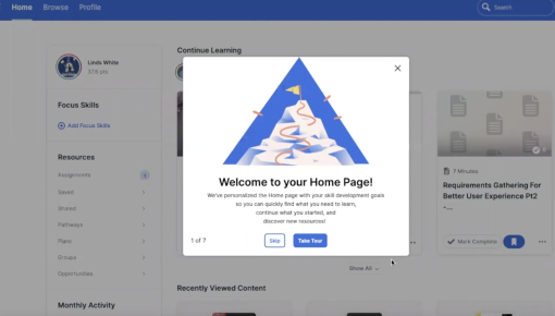 The opening step of a Degreed onboarding product tour, with a mountain-summit illustration and options to skip or take the tour.