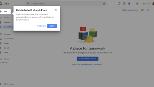 A Google Drive onboarding tooltip introducing the shared drives feature.
