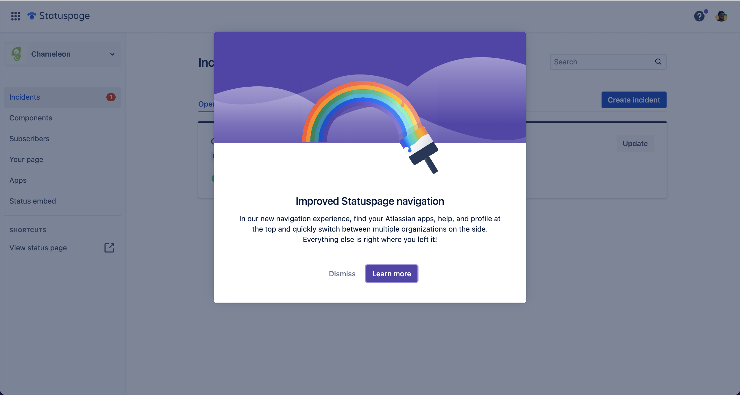A Statuspage lightbox announcing a navigation update, featuring an illustration and 'Dismiss' or 'Learn more' CTAs.