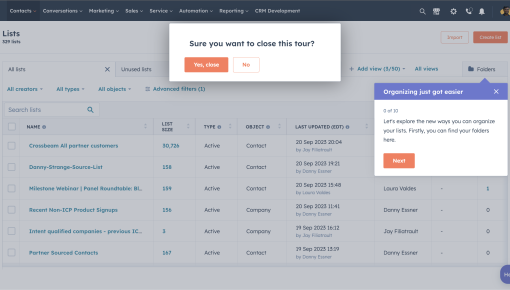 A HubSpot product tour step introducing list organization features, alongside a tour-exit confirmation modal asking whether to close the tour.