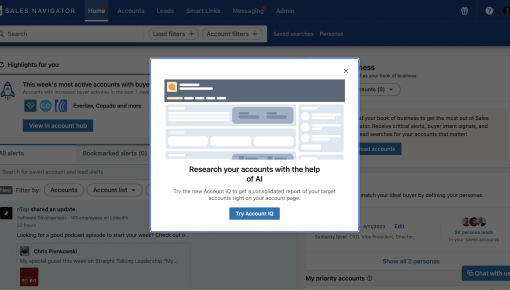 A LinkedIn Sales Navigator modal introducing a new AI-powered account research feature, with a data interface illustration and a CTA to try the feature.