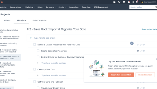 A HubSpot upsell announcement overlaid on the Projects interface, prompting users to try commerce payment tools.