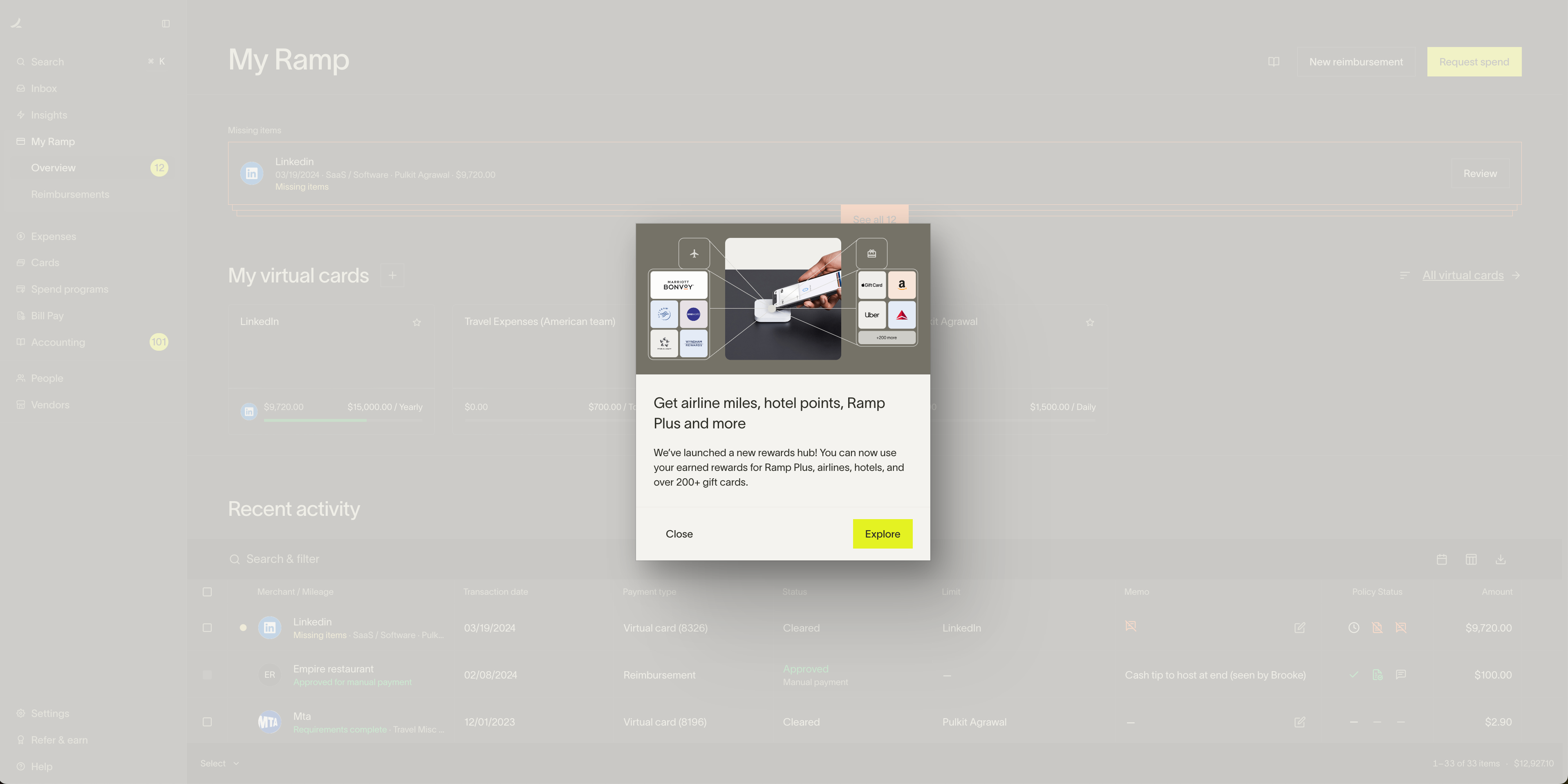 A feature announcement overlay on Ramp's expense management dashboard, introducing a new rewards hub.